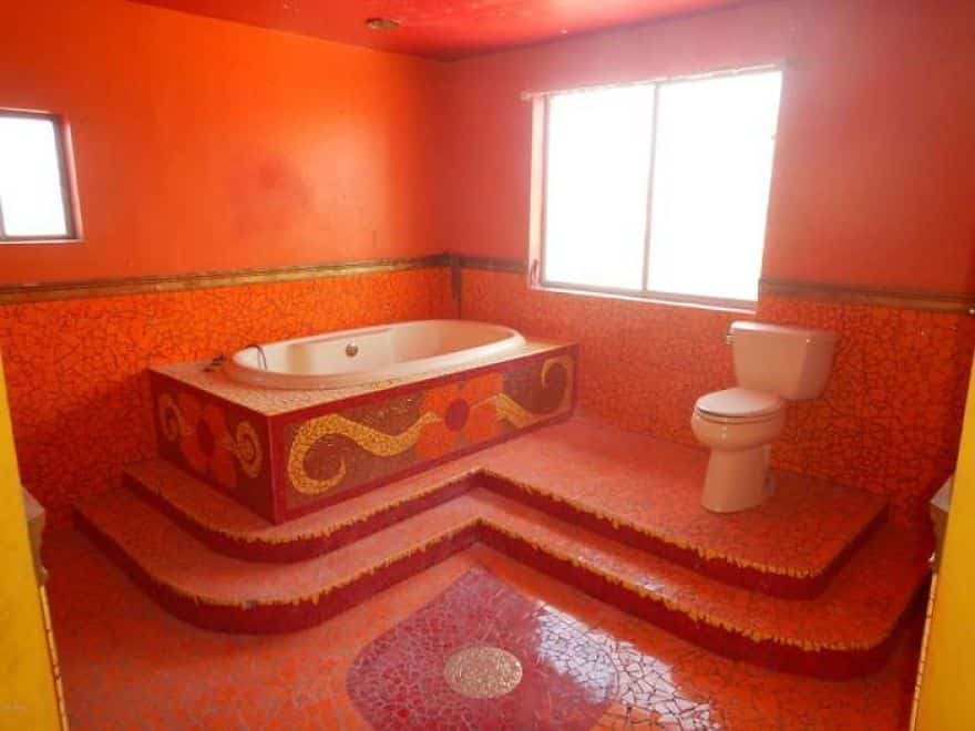 A bathroom painted an unsettling shade of red