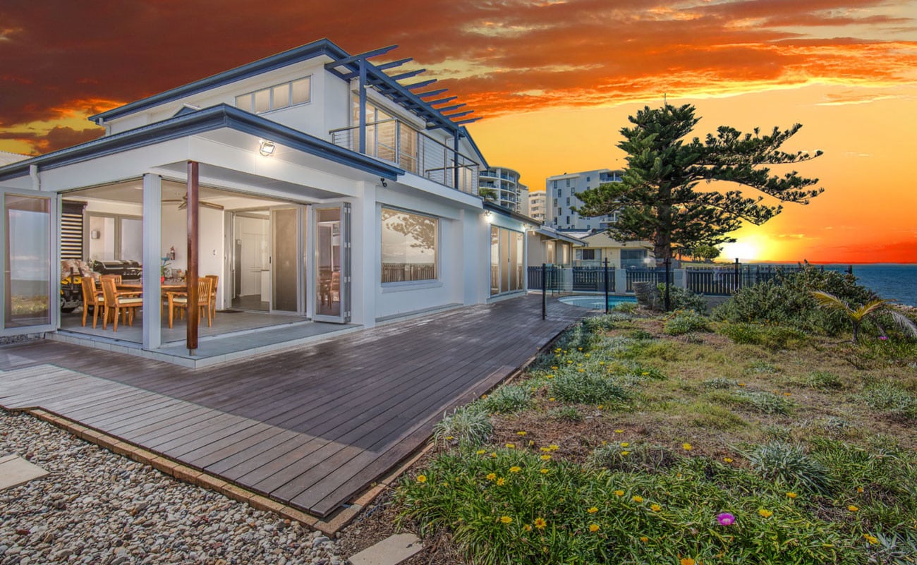 a house with a comically bright photoshopped sky