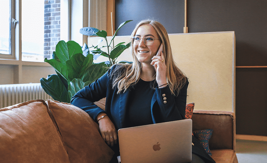 a woman calling someone with her cellphone