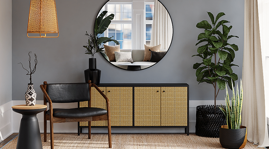 Keep accent walls neutral muted tones like this light gray accent wall behind a credenza.