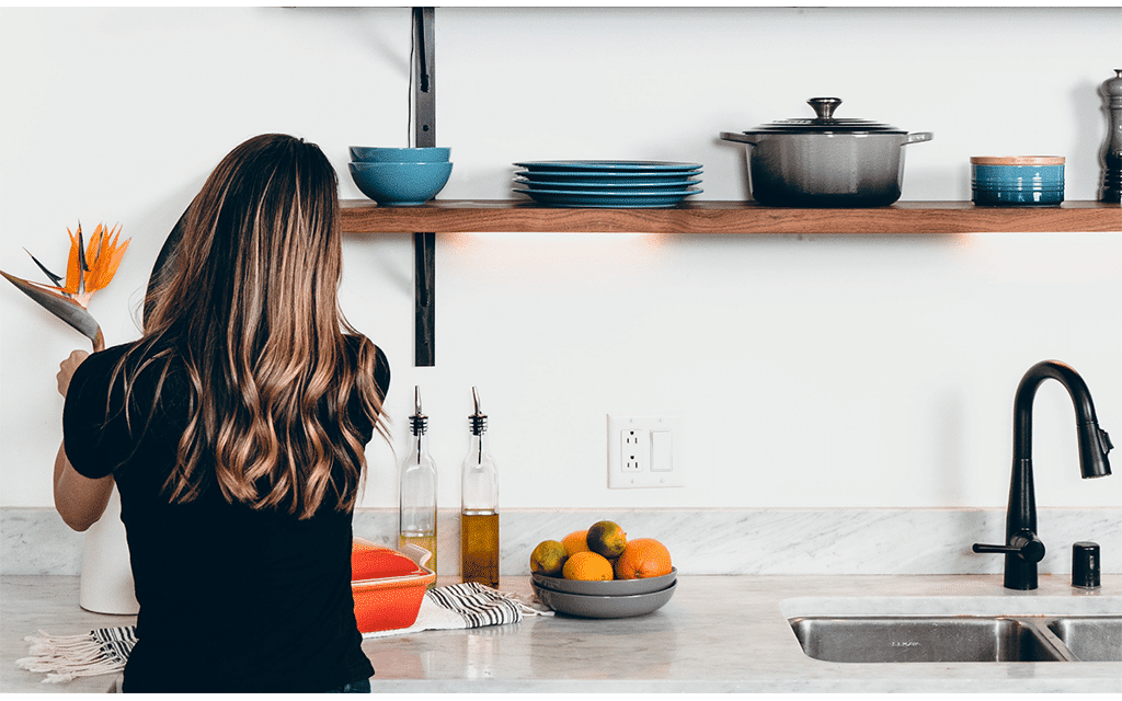 Agent staging a home in preparation for taking real estate photos